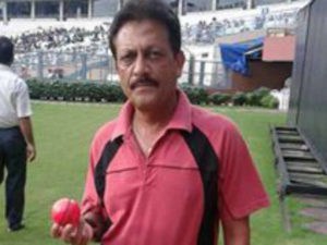 Former Bengal batsman Rajesh Dani shows the pink ball at Eden on Friday
